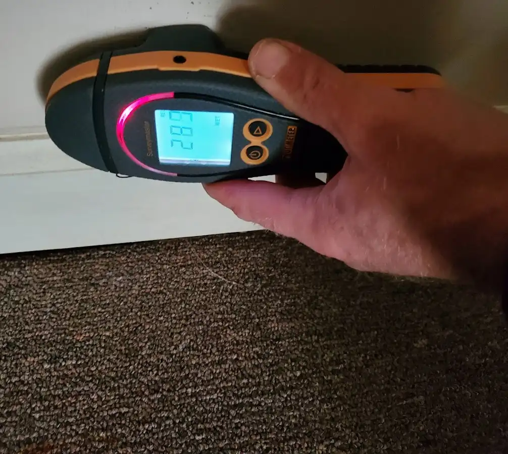 Moisture detection at baseboard during Burst Pipe Cleanup in Eagle Pass